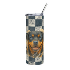 A tall insulated tumbler with a clear lid and metal straw, featuring a Rottweiler dog portrait printed over a black and distressed white checkerboard pattern, on a plain white background.