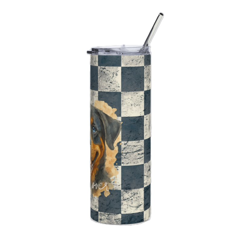 A tall insulated tumbler with a clear lid and metal straw, featuring a distressed black and white checkerboard pattern and a partial graphic of a dog on the side.