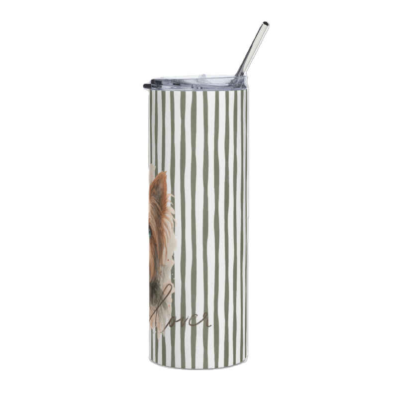 A tall insulated tumbler with a clear lid and metal straw, featuring vertical gray and white stripes and a partial dog illustration on the side.