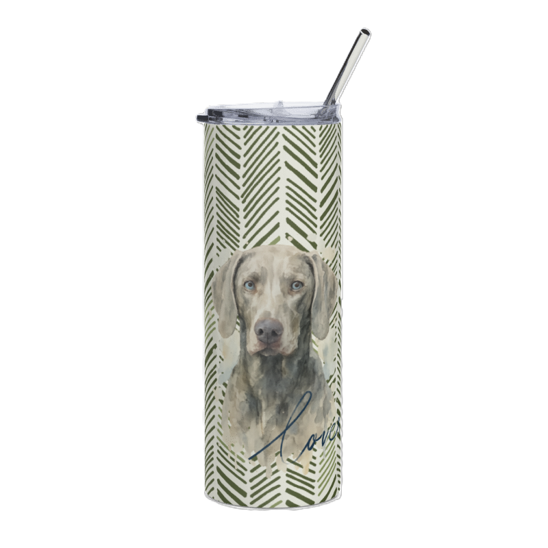 A tall insulated tumbler with a clear lid and metal straw, featuring a green and white chevron pattern and a portrait of a gray Weimaraner on the front.